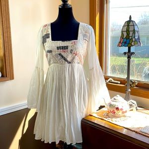 SHOW ME YOUR MUMU in a Medium, white but it’s lined so it’s not see through